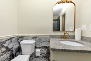 Ensuite for main bedroom showing the vanity and toilet with bidet
