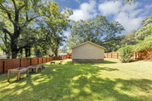 Fenced in yard and back deck