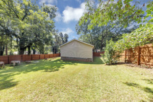 Fenced in yard and back deck