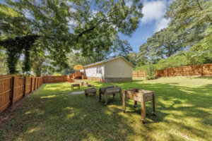 Fenced in yard and back deck